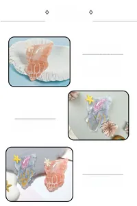 Detail of shell-shaped hair claw clips with star accents and pearlescent marble texture