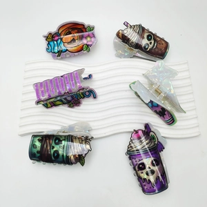 Creative Halloween hair claws featuring holographic ghost and pumpkin drink cup designs