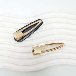 Minimalist black and translucent acrylic BB hair clips with golden metal base set