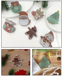 Close-up of glittery acrylic Christmas charms featuring Santa, reindeer, and snowman