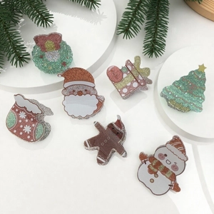 Acrylic Christmas hair clips featuring Santa, Reindeer, and Snowman with glitter finish