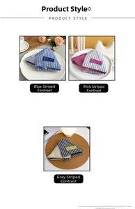 Detailed view of triangular fabric hair clips in blue, pink and grey striped patterns
