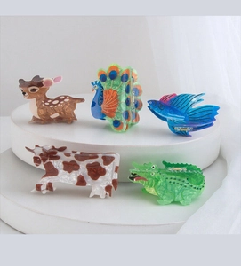 Set of five creative animal acetate hair claws including deer fish and crocodile designs