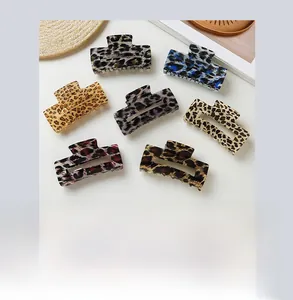 Variety of leopard print hair claws including rectangular and hollow square styles