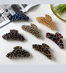 Set of seven stylish leopard print rectangular hair claws in various vibrant colors