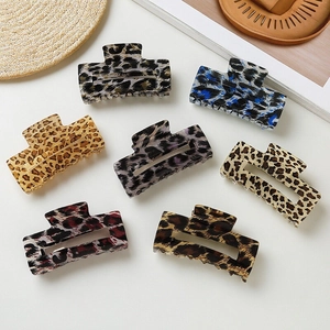 Set of seven stylish leopard print rectangular hair claws in various vibrant colors