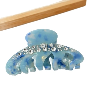 Elegant light blue marble acrylic hair claw with sparkling rhinestones for ponytail