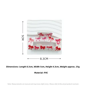 Detail showing dimensions of the rectangular hair claw clip with sweet bow and cherry pattern