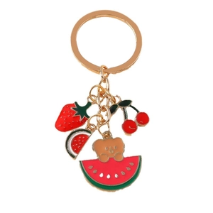 Cute fruit keychain with golden frame featuring strawberry, cherry and watermelon bear