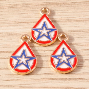 Detail of three star shield enamel pendants with red white and blue for DIY keychain charms