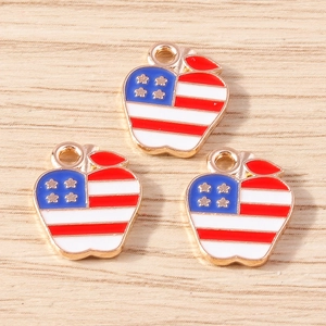 Detail view of apple-shaped US flag enamel pendants with stars and stripes for DIY crafts