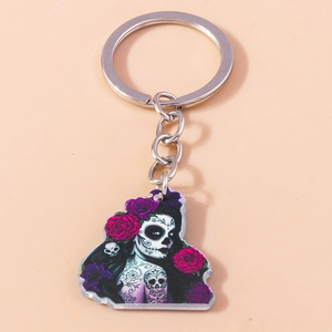 Detailed view of Day of the Dead keychain with acrylic sugar skull and rose pendant charm