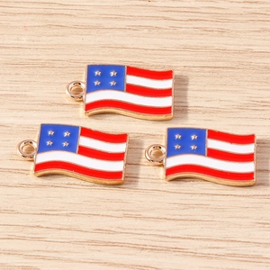 Detail view of three American flag charms in gold-tone alloy for DIY creative keychains