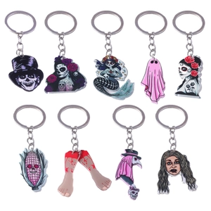 9-piece Halloween keychain set with acrylic horror elements and skull charms