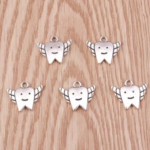 Set of 5 vintage silver smiling winged tooth charms for DIY jewelry and accessory making