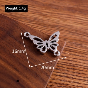 Detailed silver butterfly charm dimensions showing 16x20mm size and 1.4g weight