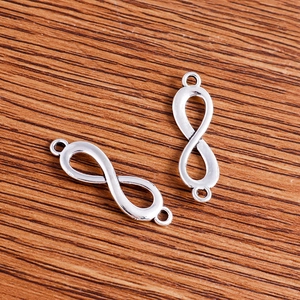 Pair of polished silver infinity link connectors for DIY jewelry making and assembly