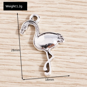 Silver flamingo charm detail with feather texture, 28mm x 18mm jewelry accessory