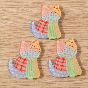 Three acrylic cat-shaped pendants with floral patchwork prints for DIY jewelry making