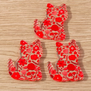Three transparent acrylic cat charms with red floral patterns for DIY jewelry making