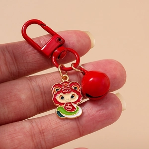 Handheld red cartoon zodiac snake keychain with metal lobster clasp and lucky bell charm