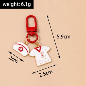 Detailed view of medical nurse uniform and hat keychain pendants with size measurements