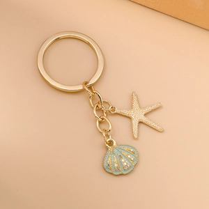 Minimalist gold starfish and pearl shell keychain with rhinestones for backpack decor