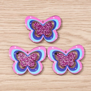 Colorful hollow butterfly acrylic pendants for DIY jewelry with glitter detail and metal loops