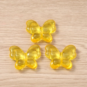 Set of three transparent yellow 3D resin butterfly charms for DIY jewelry making