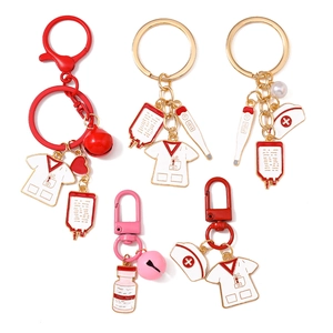 Medical themed keychain with nurse uniform, heart, and thermometer charms for bags