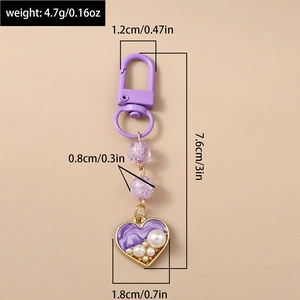 Size details of purple heart keychain with faux pearls and measurements in cm and inches