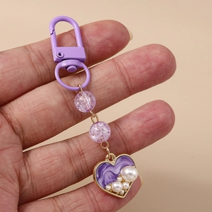 Lavender heart keychain with ice-crack beads and pearls on purple D-ring clasp