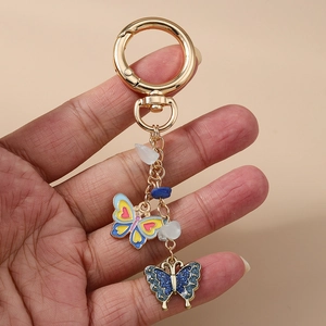Modischer Schmetterling Herz Schlüsselanhänger mit goldenem Karabiner und Emaille