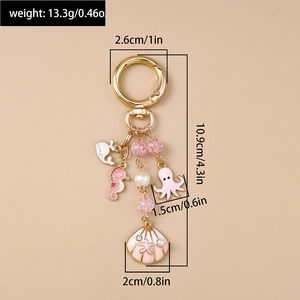 Détail d'un porte-clés nautique avec pieuvre, hippocampe et dimensions du pendentif