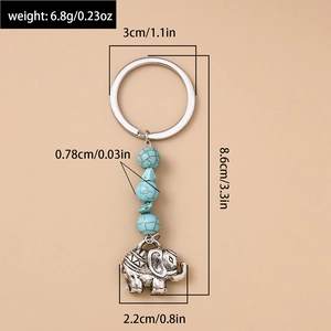 Guide des dimensions du porte-clés éléphant vintage avec perles turquoise et pendentif en argent