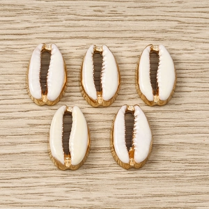 DIY shell jewelry pendants with gold edges and white glaze for necklaces and bracelets