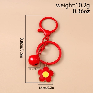 Detailed view of red flower keychain with bell and dimensions showing 8.8cm total length