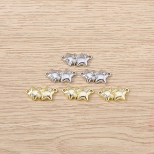 Detail of star pendant charms with rhinestones and pearls for DIY jewelry making