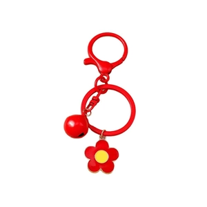 Red flower pendant keychain with metal bell and lobster clasp on white background