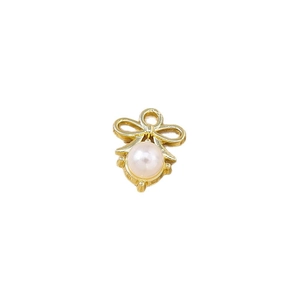 Elegant gold bow pendant with a round white pearl for necklaces and bracelets