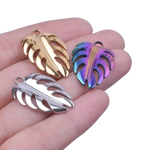 Three-color monstera leaf charms in gold, silver and rainbow finish for DIY jewelry