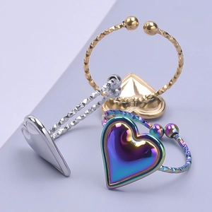 Polished heart-shaped adjustable rings in gold, silver, and iridescent finishes