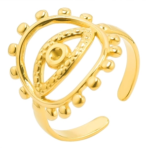 Detailed macro view of the golden adjustable evil eye ring with beaded metal textures