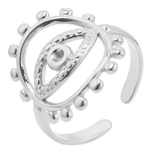 Close-up of silver evil eye ring featuring layered concentric rings and beaded edges