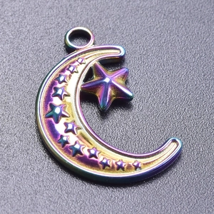 Macro shot of rainbow gradient moon and star pendant in 18k gold plated stainless steel