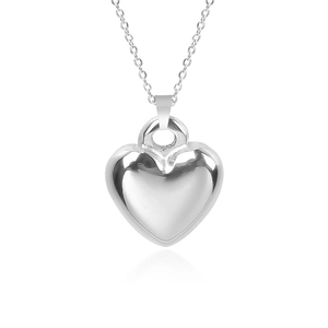 Polished silver heart pendant necklace with fine chain and reflective mirror finish