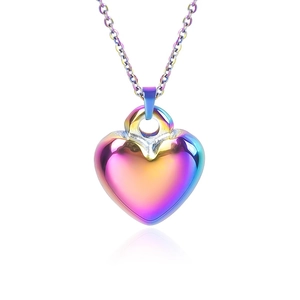 Macro shot of a 18k vacuum plated rainbow heart pendant with polished mirror finish