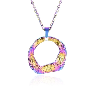Detail of irregular geometric pendant with hammer finish and rainbow aurora plating