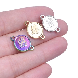 Three elliptical stainless steel tree pendants in rainbow, gold and silver finishes