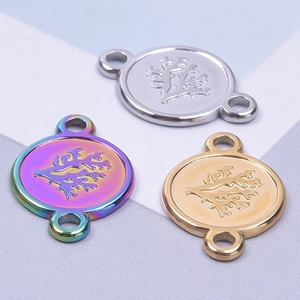 Polished stainless steel round tree pendants in gold, silver, and rainbow finishes